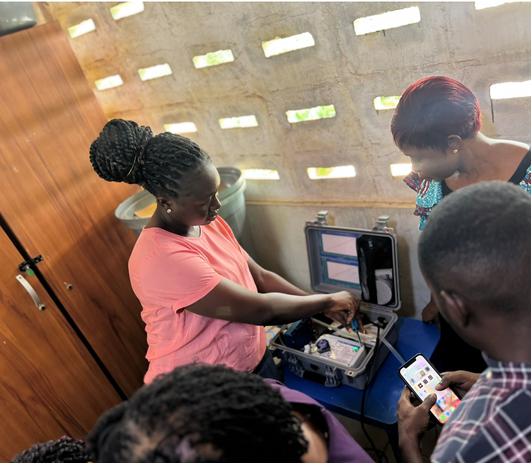 Woman unscrewing the control panel on the STREAM disinfectant generator